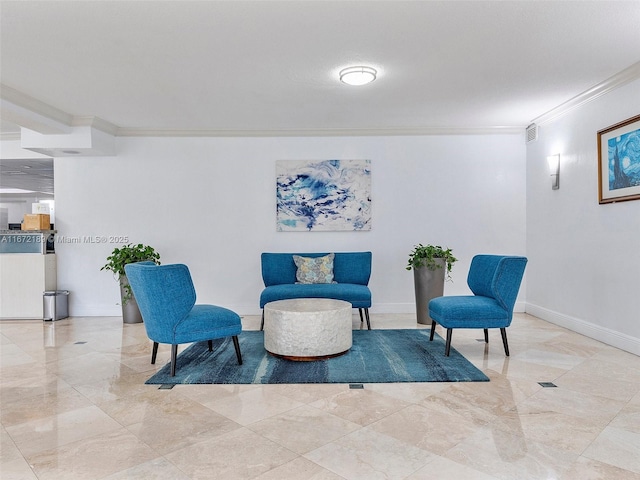 living area featuring ornamental molding