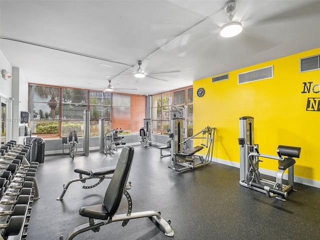 exercise room with ceiling fan