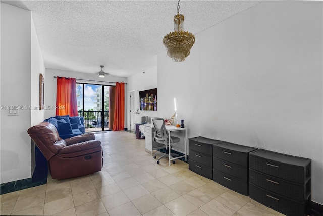 home office featuring ceiling fan, a textured ceiling, and light tile patterned flooring