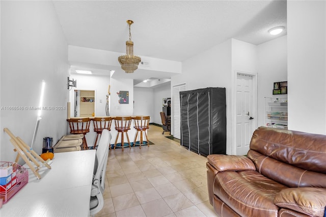 tiled living room with a textured ceiling