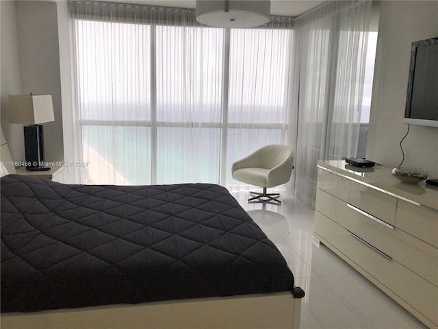 bedroom with tile patterned floors