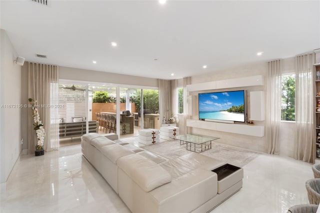 living room with plenty of natural light