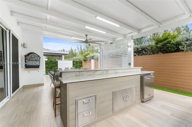 view of patio / terrace with ceiling fan