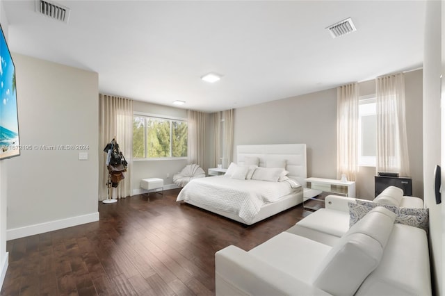 bedroom featuring dark hardwood / wood-style floors