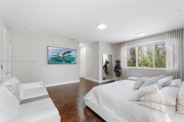 bedroom featuring dark wood-type flooring