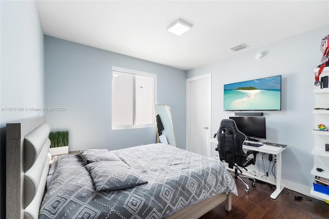 bedroom featuring wood-type flooring