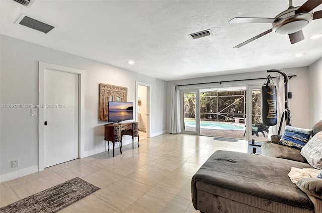 living room featuring ceiling fan