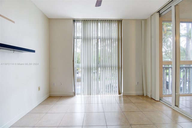 spare room with light tile patterned floors