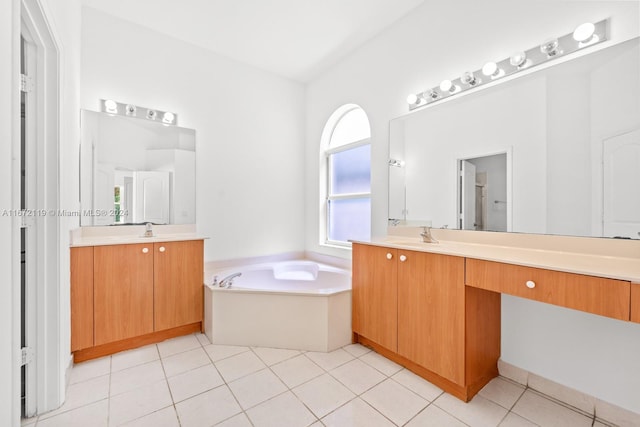 bathroom featuring shower with separate bathtub, tile patterned flooring, and vanity