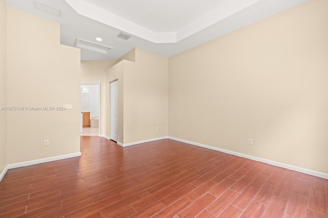 spare room featuring hardwood / wood-style floors