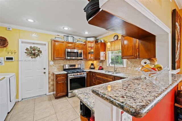 dining area with light hardwood / wood-style flooring, a wealth of natural light, and ornamental molding