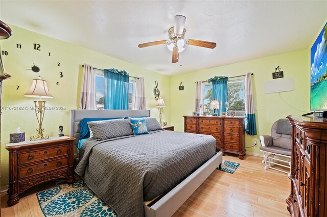 bedroom featuring ceiling fan and light wood-type flooring