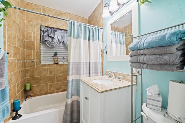 full bathroom with shower / tub combo with curtain, vanity, and toilet