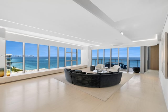 living room featuring a water view