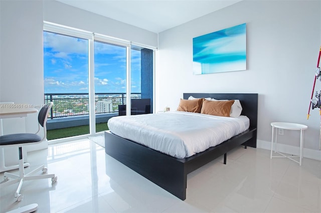 tiled bedroom featuring access to exterior