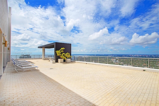 view of patio / terrace featuring a water view