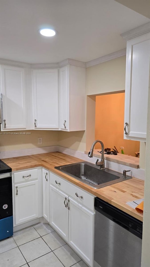 kitchen featuring appliances with stainless steel finishes and white cabinetry