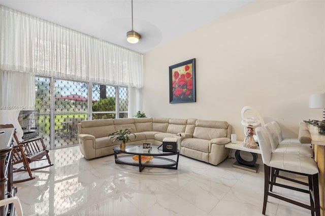 living room featuring ceiling fan