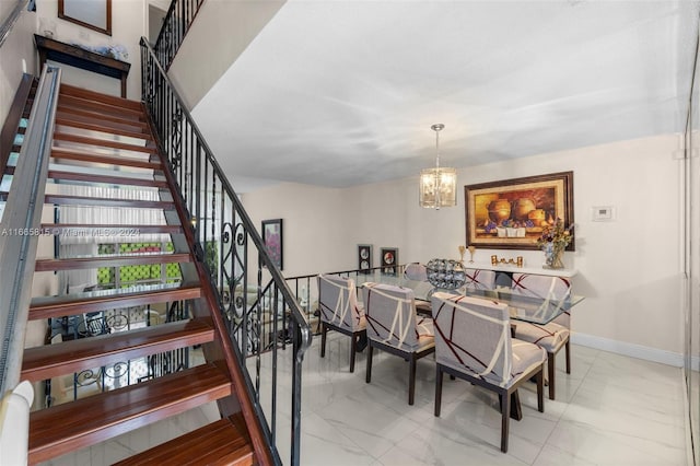 dining room with a notable chandelier