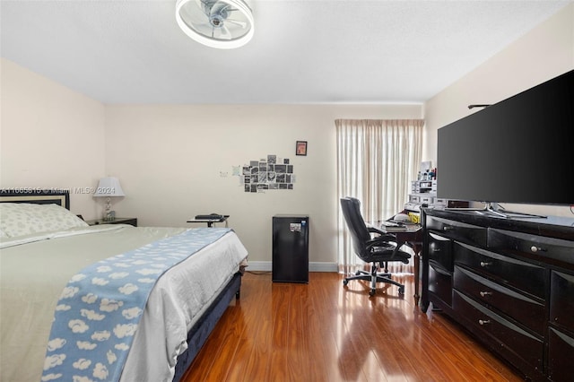 bedroom featuring hardwood / wood-style flooring