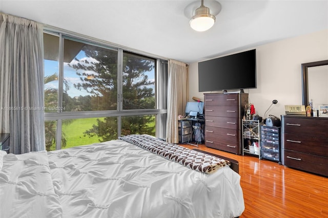 bedroom with light wood-type flooring