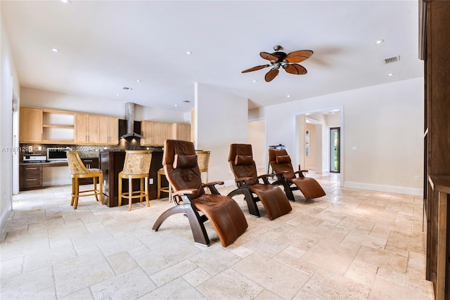 living room featuring ceiling fan