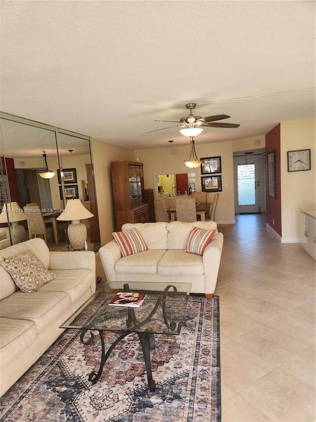 living room featuring ceiling fan