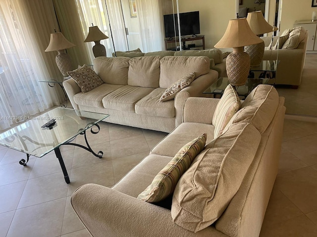 living room with light tile patterned floors