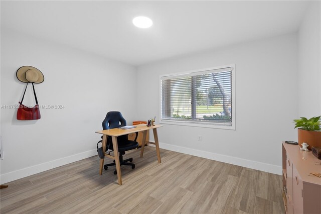 office area with light wood-type flooring