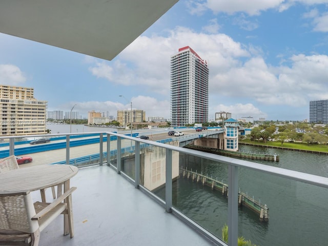 balcony featuring a water view