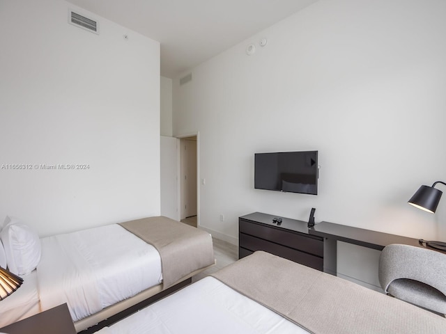 bedroom with light hardwood / wood-style flooring