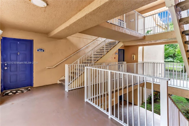 interior space featuring a balcony