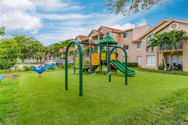 view of jungle gym featuring a yard