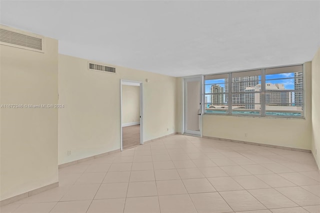 empty room featuring light tile patterned flooring