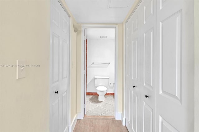 hallway featuring light hardwood / wood-style floors