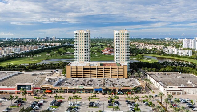 1745 E Hallandale Beach Blvd Unit 1804W, Hallandale Beach, FL 33009 - drone / aerial view featuring a water view, view of golf course, and a city view