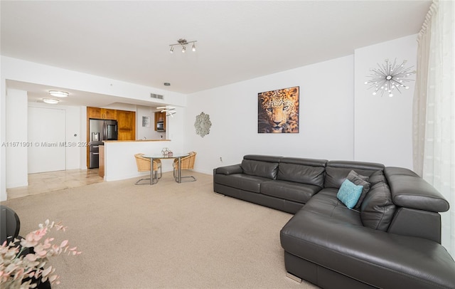 living room with light carpet