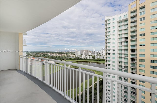 balcony featuring a water view