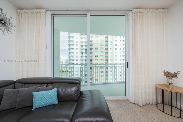 1745 E Hallandale Beach Blvd Unit 1804W, Hallandale Beach, FL 33009 - living area with carpet flooring and baseboards