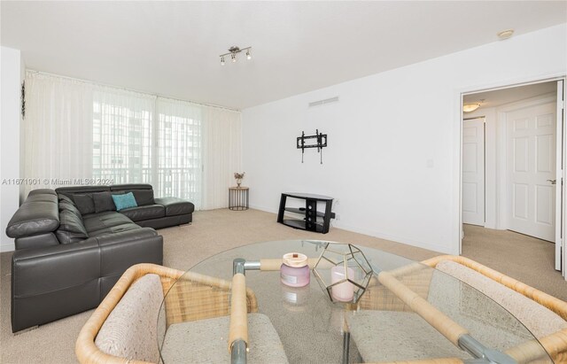 1745 E Hallandale Beach Blvd Unit 1804W, Hallandale Beach, FL 33009 - carpeted living area with visible vents and baseboards