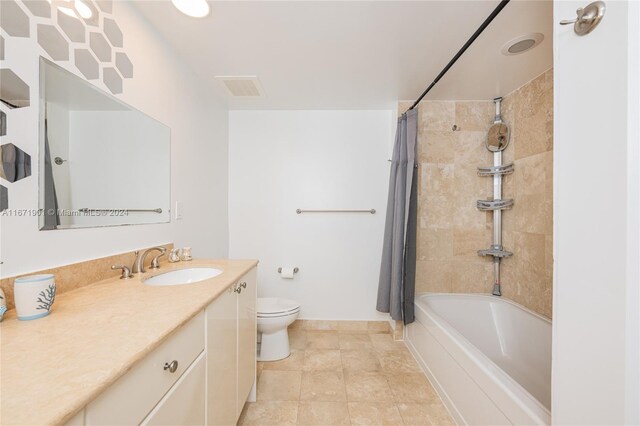 1745 E Hallandale Beach Blvd Unit 1804W, Hallandale Beach, FL 33009 - full bath featuring vanity, shower / tub combo with curtain, visible vents, and toilet