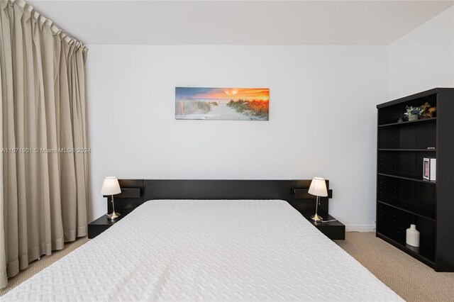 1745 E Hallandale Beach Blvd Unit 1804W, Hallandale Beach, FL 33009 - bedroom featuring baseboards and carpet flooring
