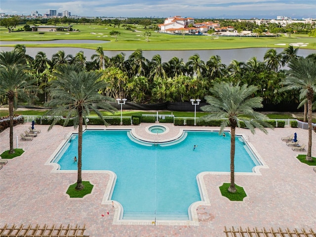 view of swimming pool featuring a patio area