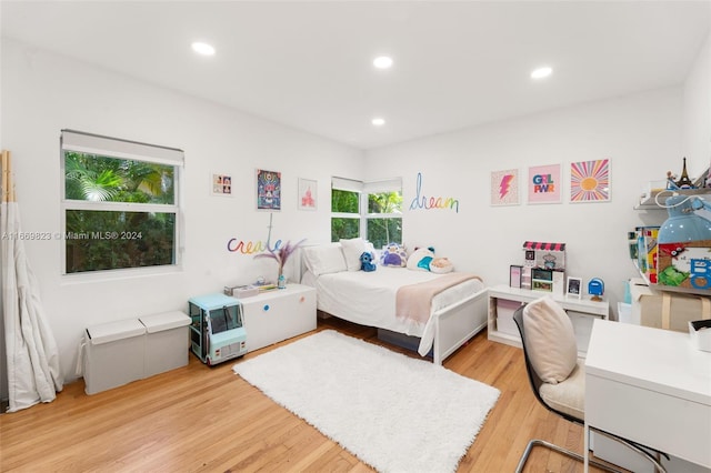 bedroom featuring light hardwood / wood-style floors