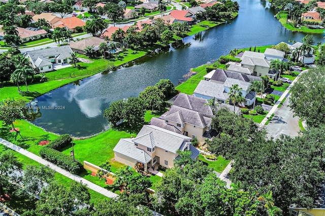 drone / aerial view with a water view