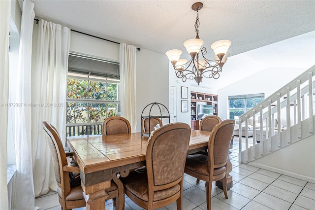2913 Myrtle Oak Cir, Davie, FL 33328 - dining room with a chandelier, light tile patterned flooring, stairs, and lofted ceiling
