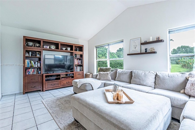 tiled living room featuring high vaulted ceiling