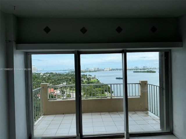 balcony featuring a water view