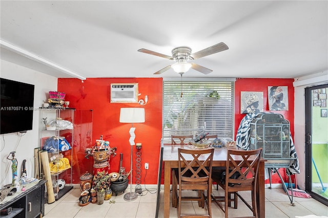 dining room featuring a wall unit AC, tile patterned flooring, and ceiling fan