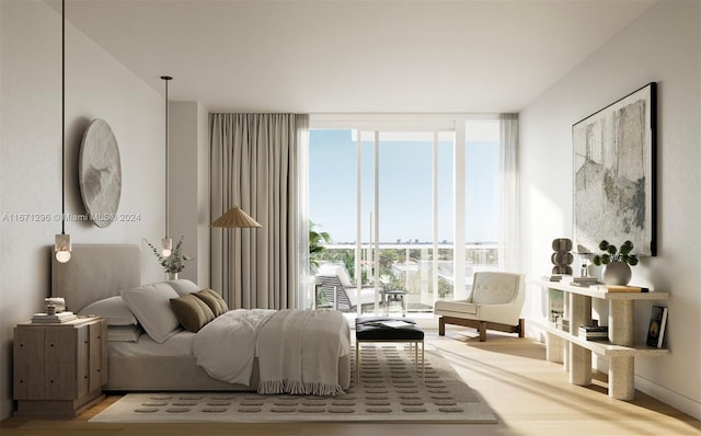 bedroom featuring hardwood / wood-style flooring and expansive windows